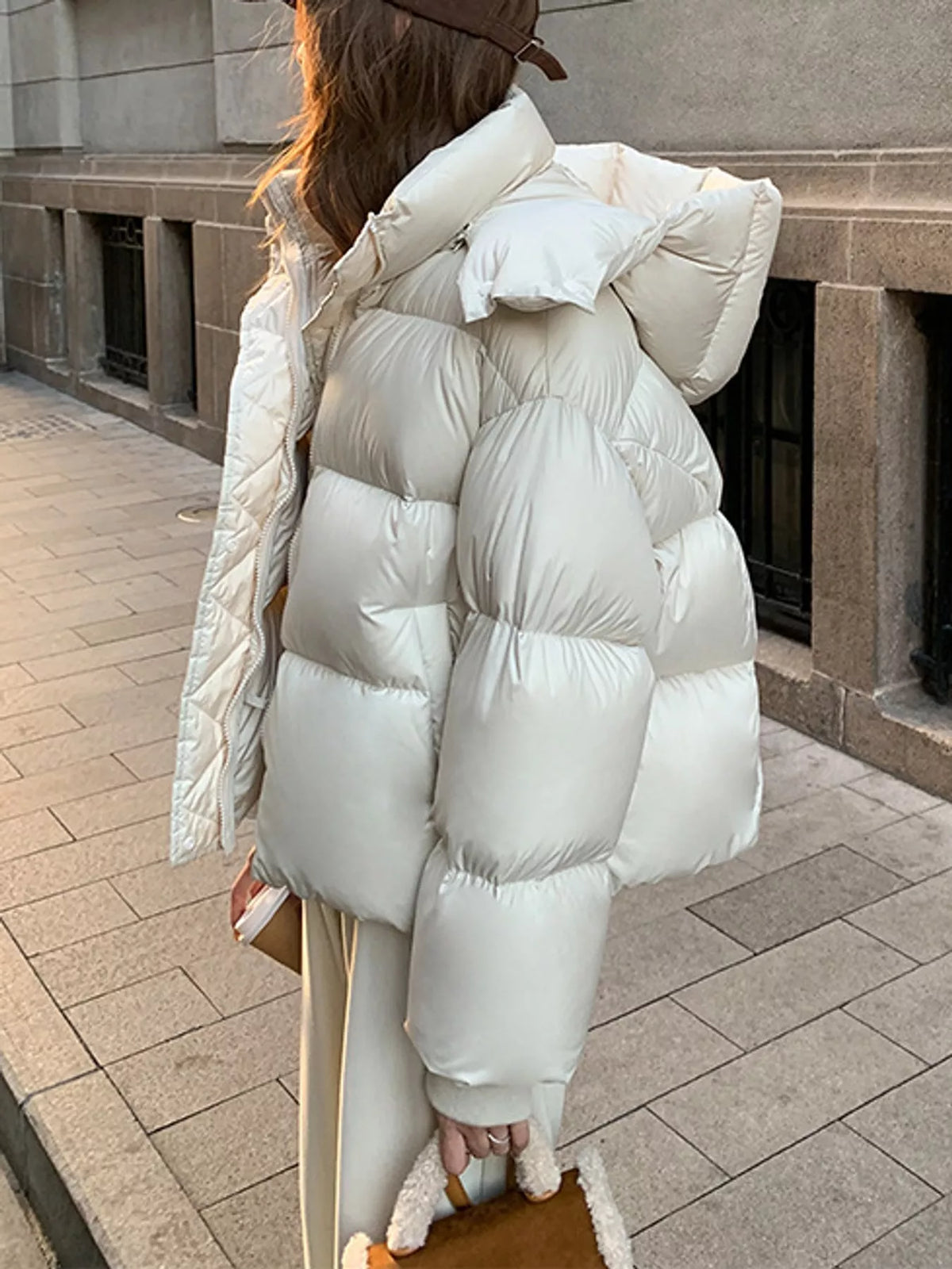 Cream quilted hooded puffer jacket, side view
