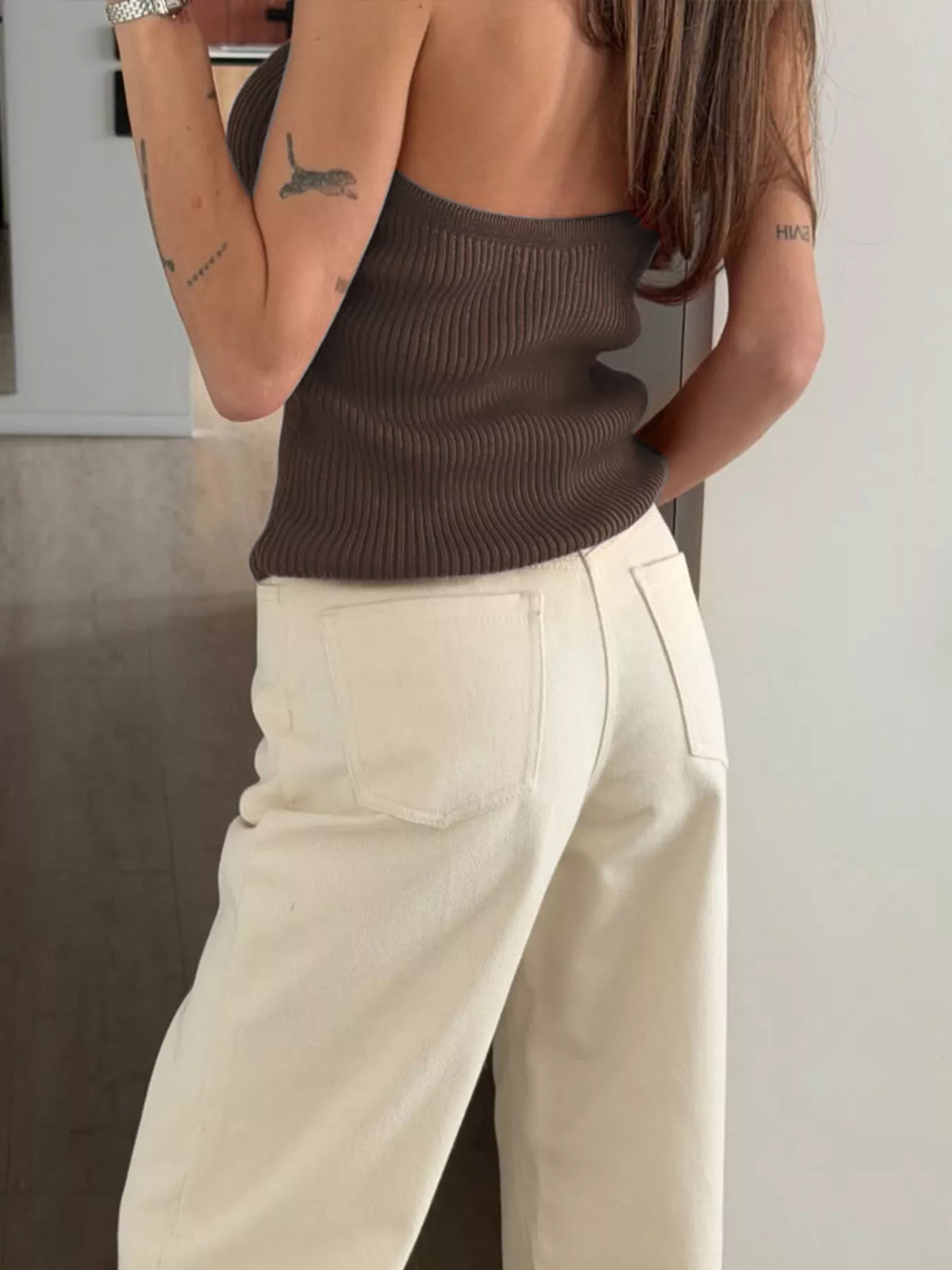 Brown ribbed halter-neck tank, back view at an angle