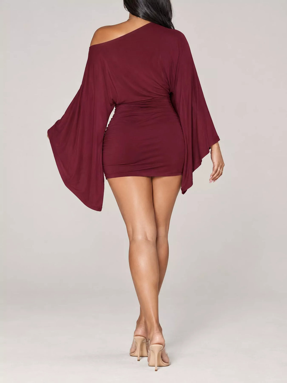 Women's One-Shoulder Draped Bodycon Mini Dress in burgundy — back view