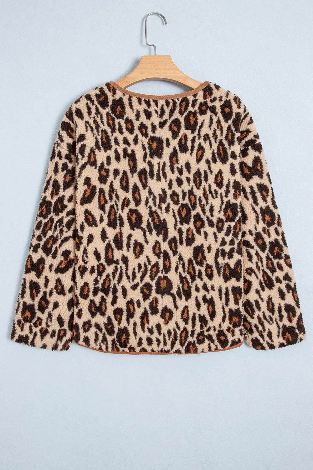 Leopard plush jacket with brown corduroy trim, back on hanger