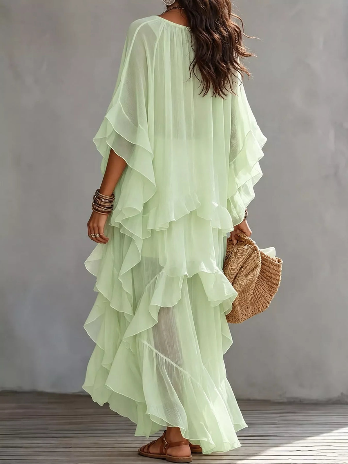 Pale green ruffled layered bohemian maxi dress, back view