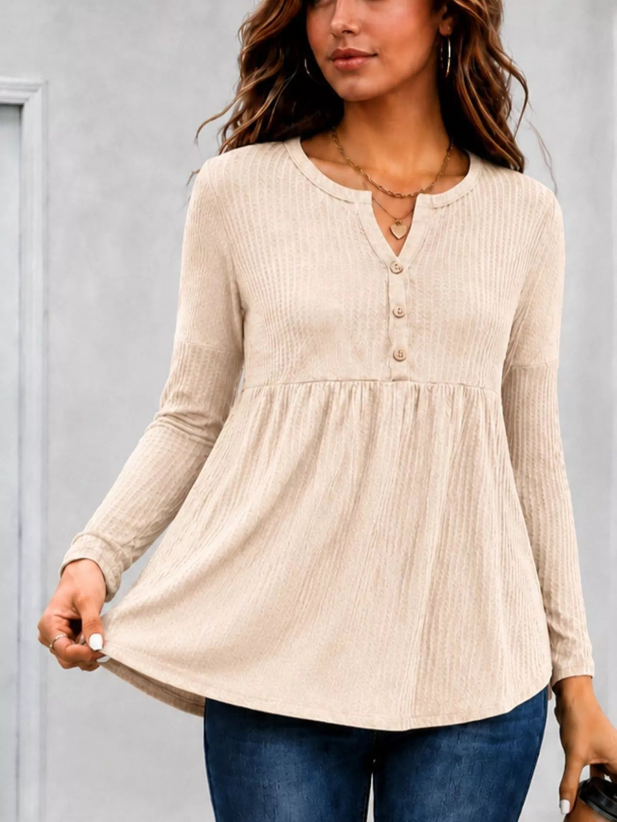 Women's Textured Long Sleeve Peplum Top in Beige, back view
