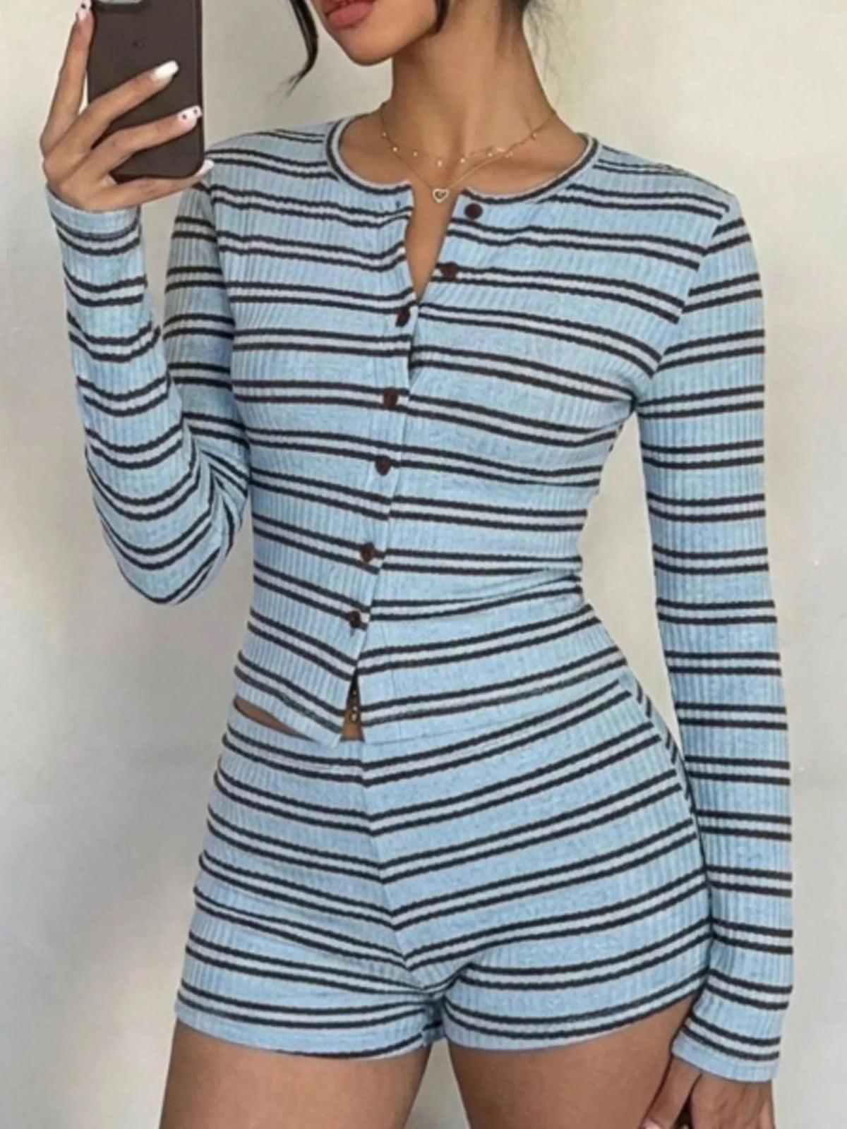 Striped cardigan and shorts set in light blue, front mirror view
