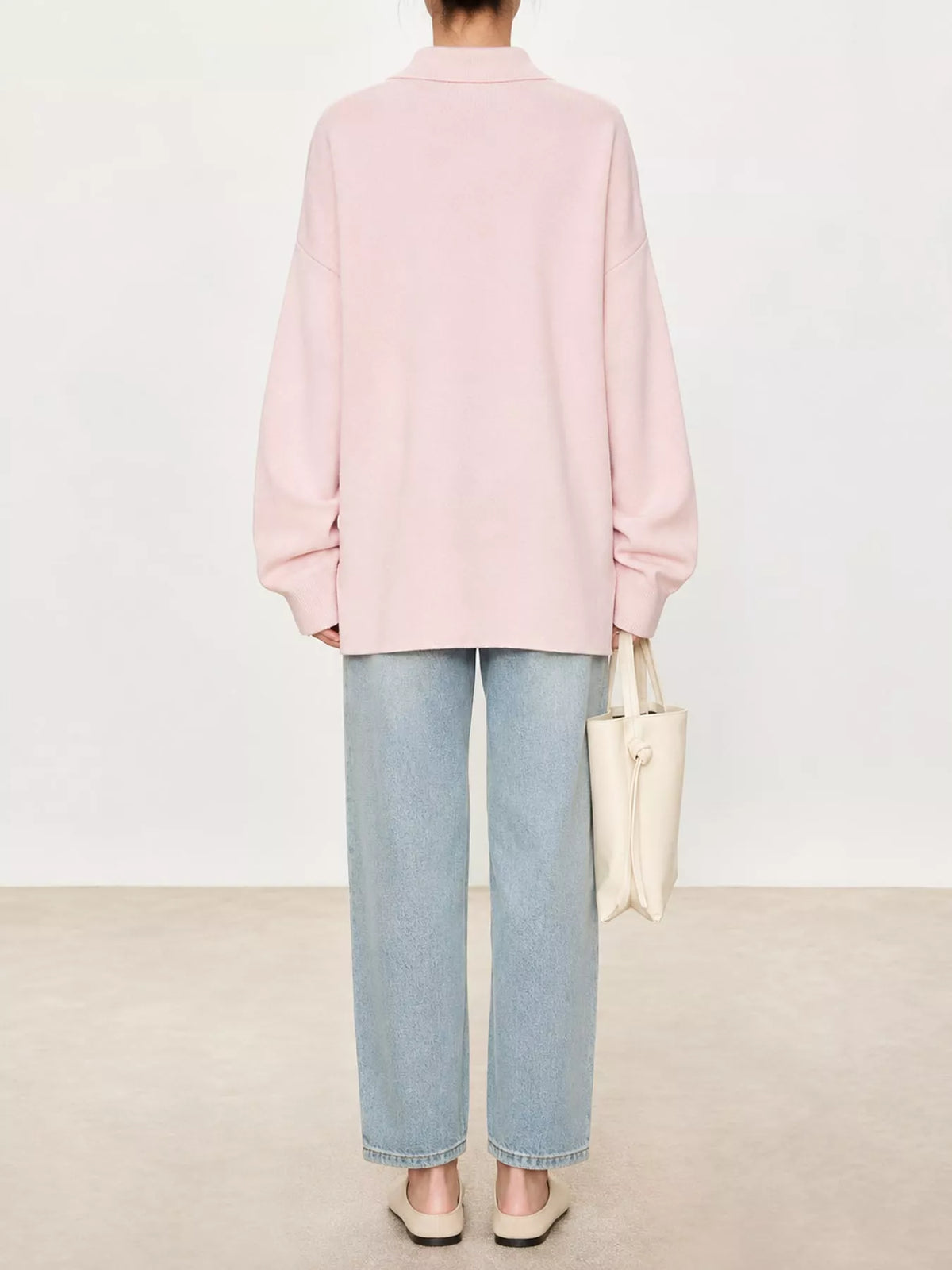 Pink dropped shoulder polo collar sweater, back view