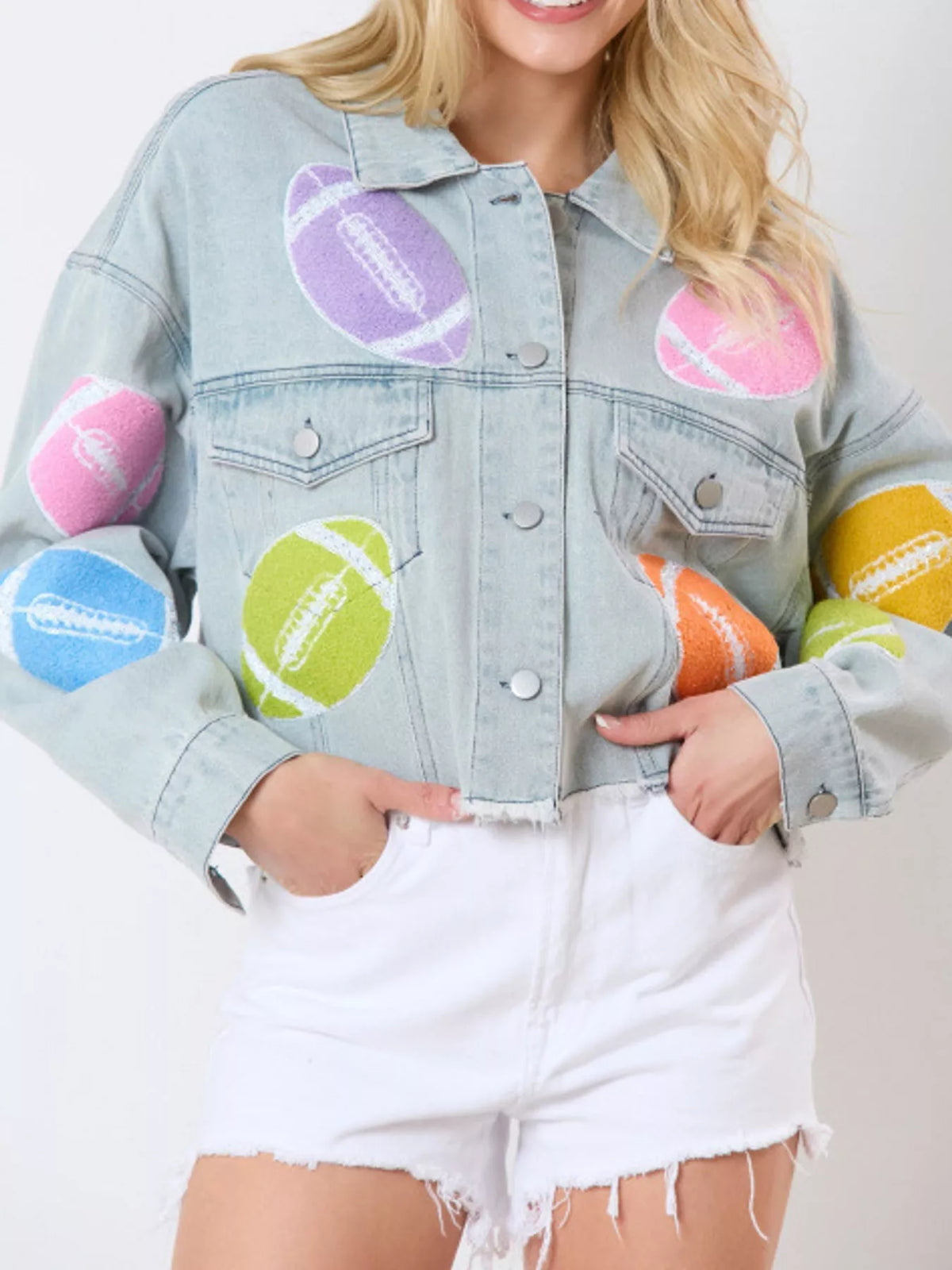 Light blue cropped denim jacket with colorful round appliques