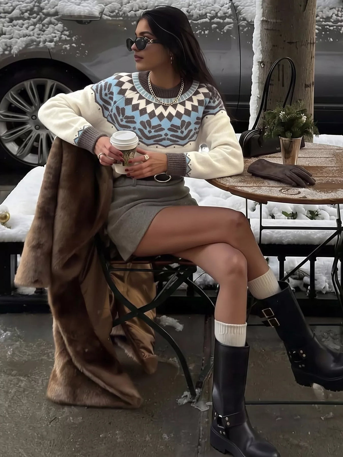 Cream Fair Isle round neck sweater, seated styled view