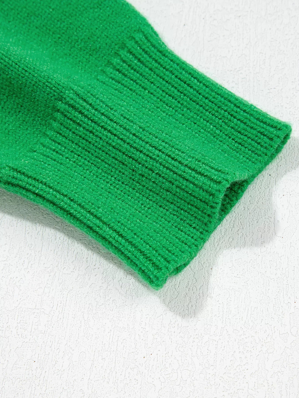 Christmas patch sweater, cuff detail