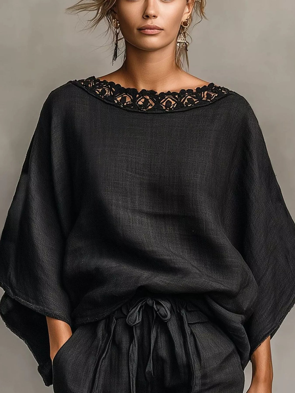 Black lace-trim top and drawstring shorts set, lace neckline and waist detail.