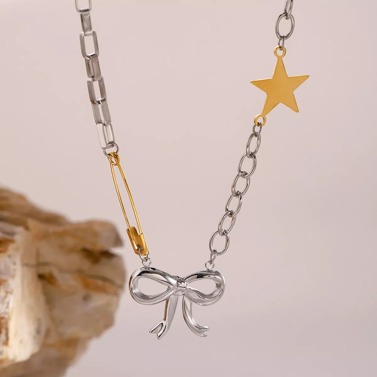 Trendsi Two-Tone Bow Star Necklace -