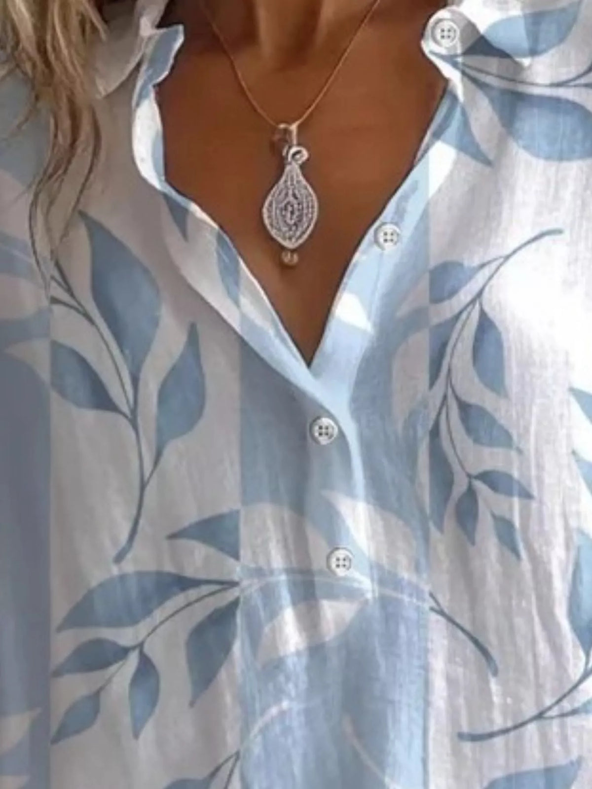Women's Leaf Print Long Sleeve Blouse in light blue — neckline detail view
