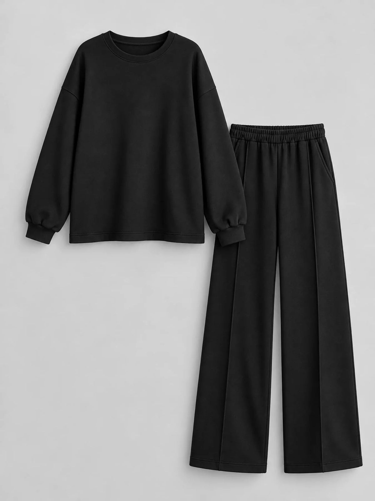 Black oversized sweatshirt and wide-leg pants set — front view