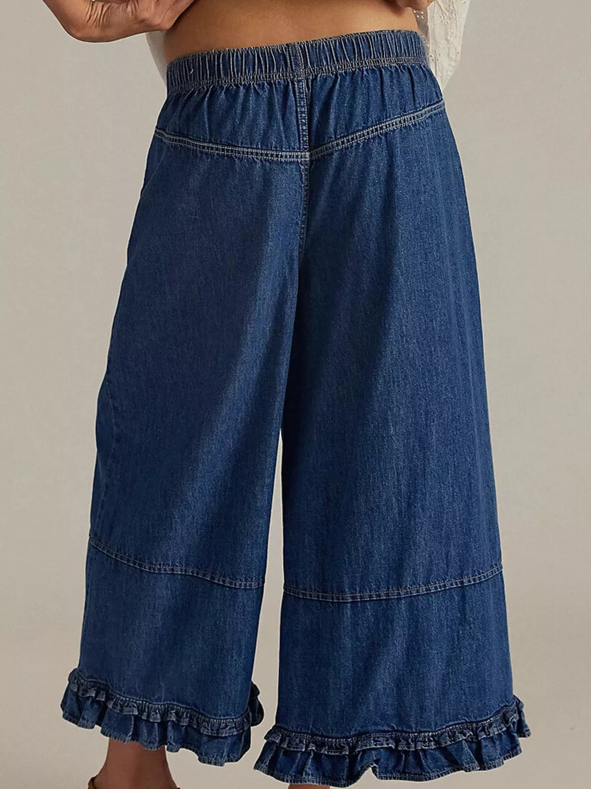 Blue wide-leg ruffle-hem jeans, back view