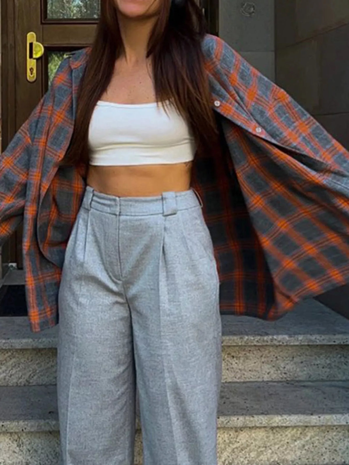 Orange and gray plaid button-up shirt with chest pockets