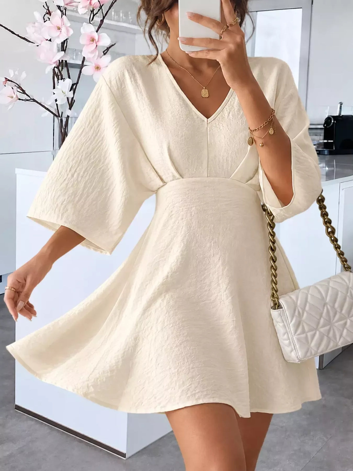 V-Neck Textured Mini Dress in beige