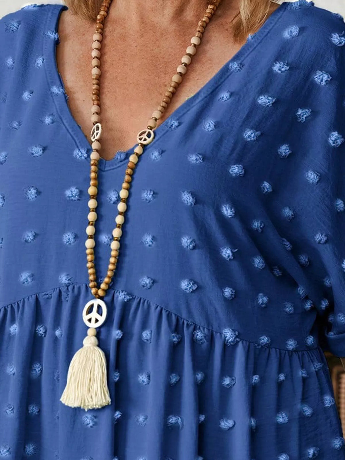 Swiss-dot blouse, blue neckline detail