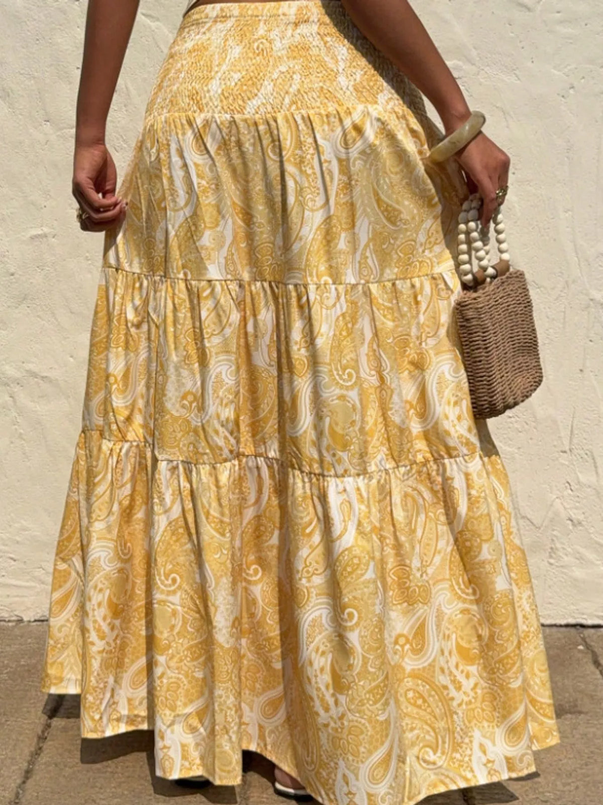 Women's Paisley Print Tiered Maxi Skirt in yellow — back view