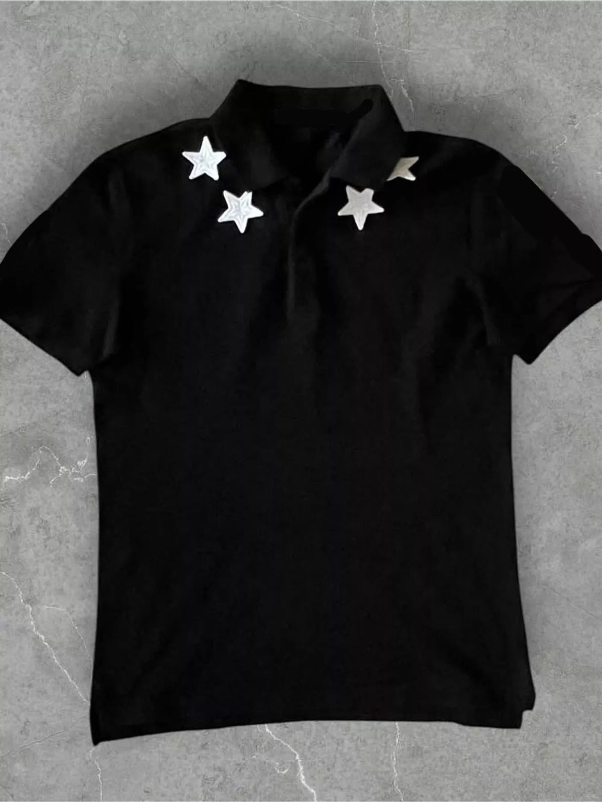Black star-embellished polo t-shirt