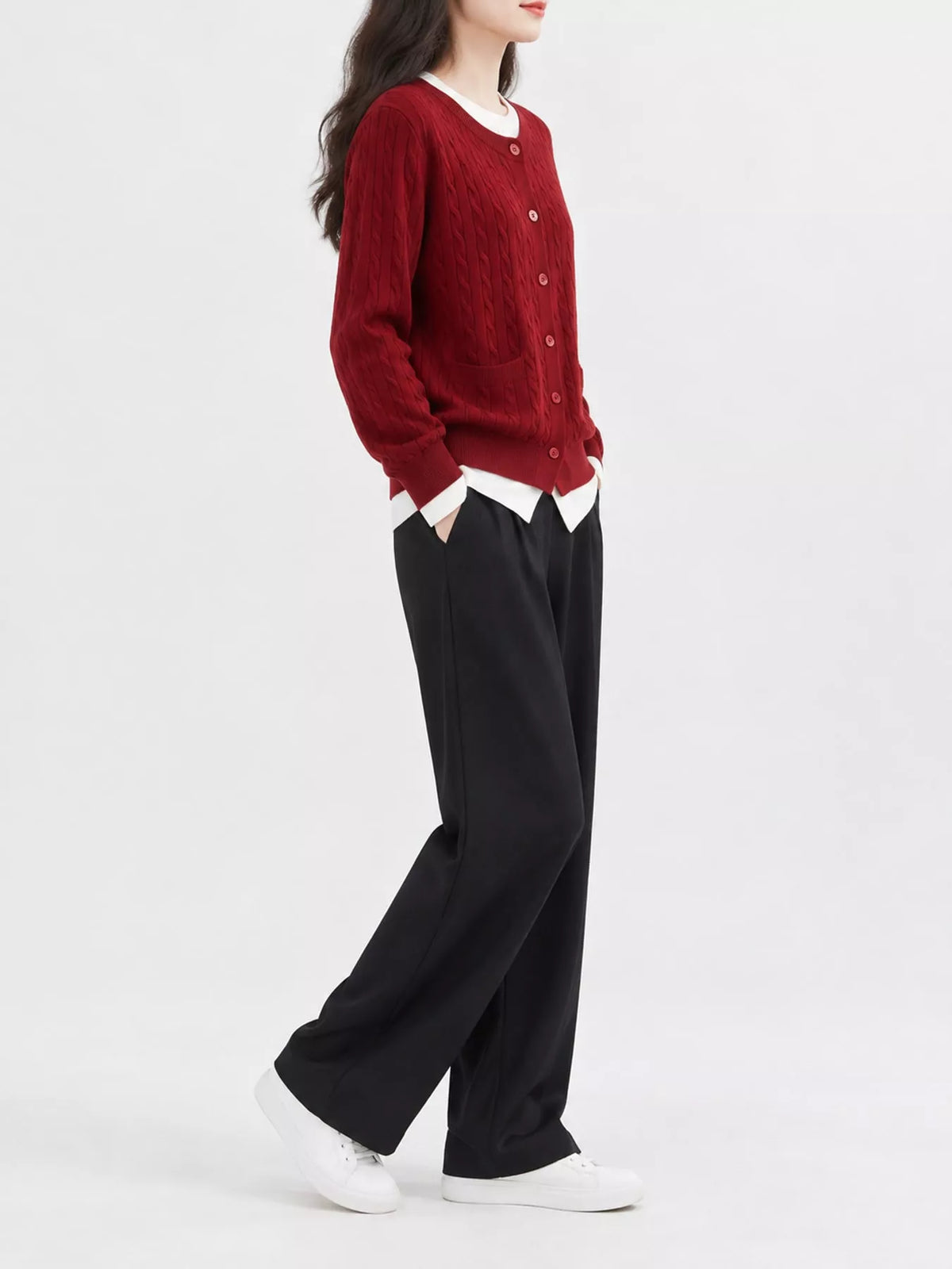 Red cable-knit button-down cardigan, side view