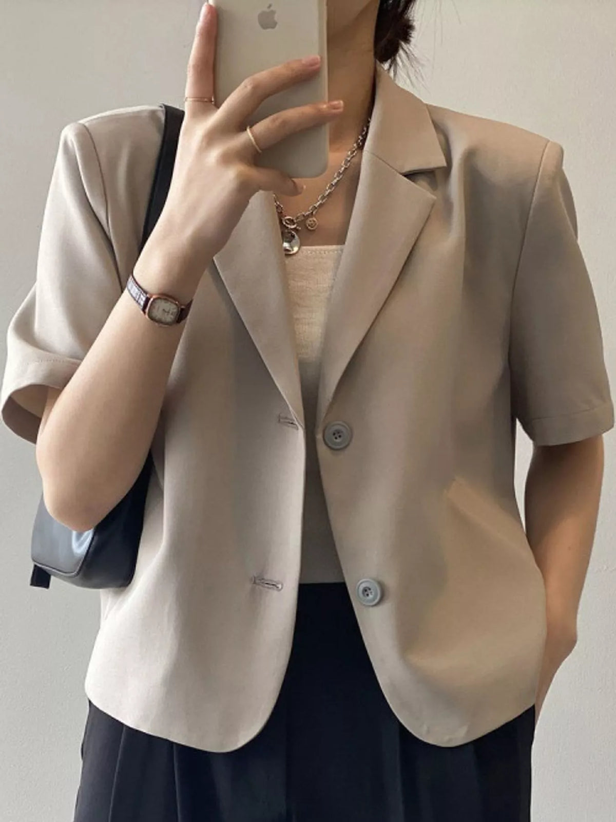 Collared short sleeve blazer, front view on model