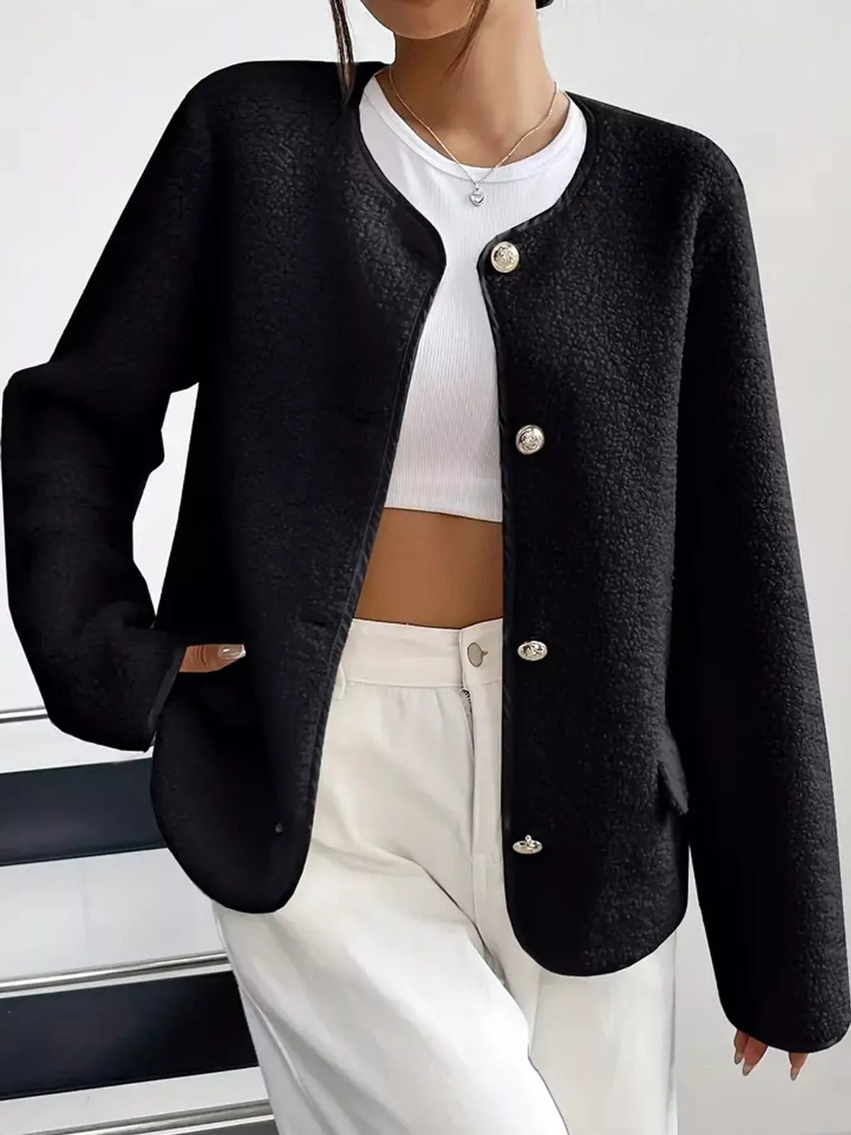 Black textured button-front jacket — front view
