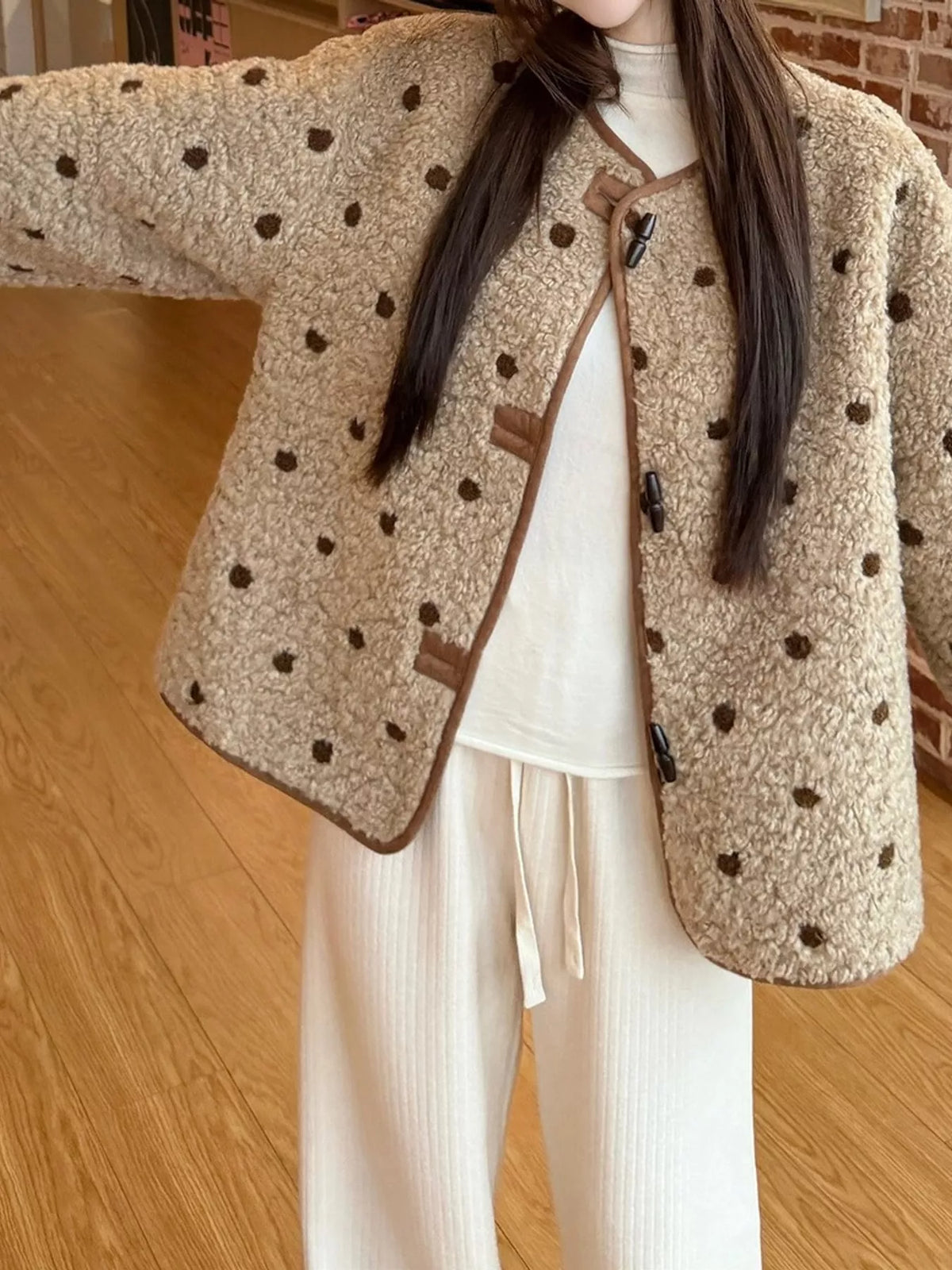 Beige with brown polka dots polka dot toggle jacket, front view