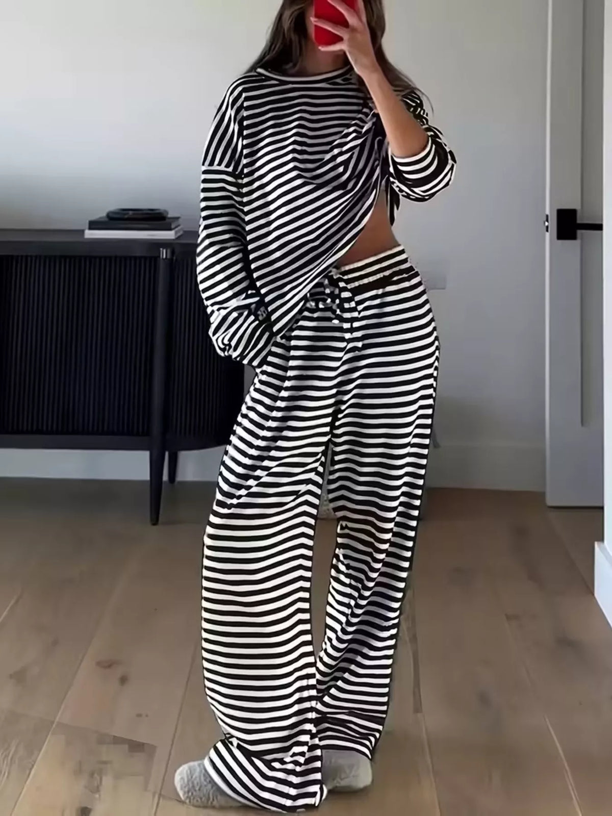 Black striped long-sleeve top and pants set, front view