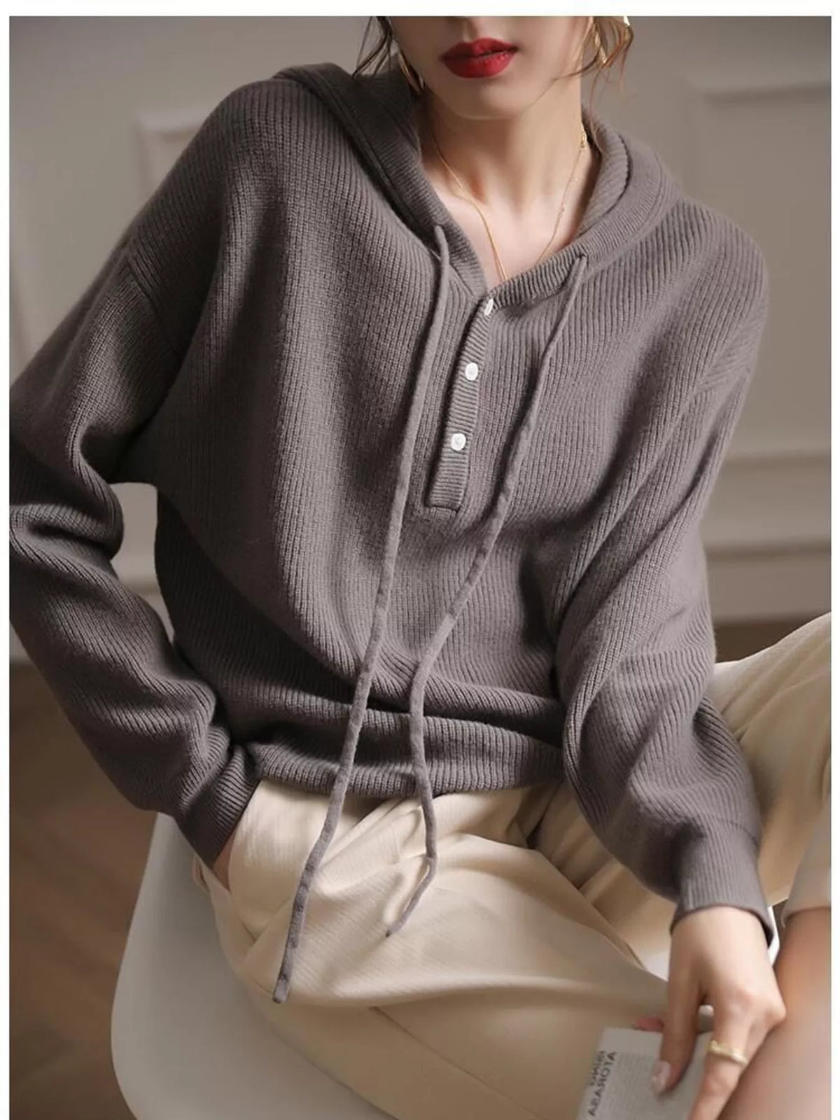 Hooded long sleeve sweater, front view on model