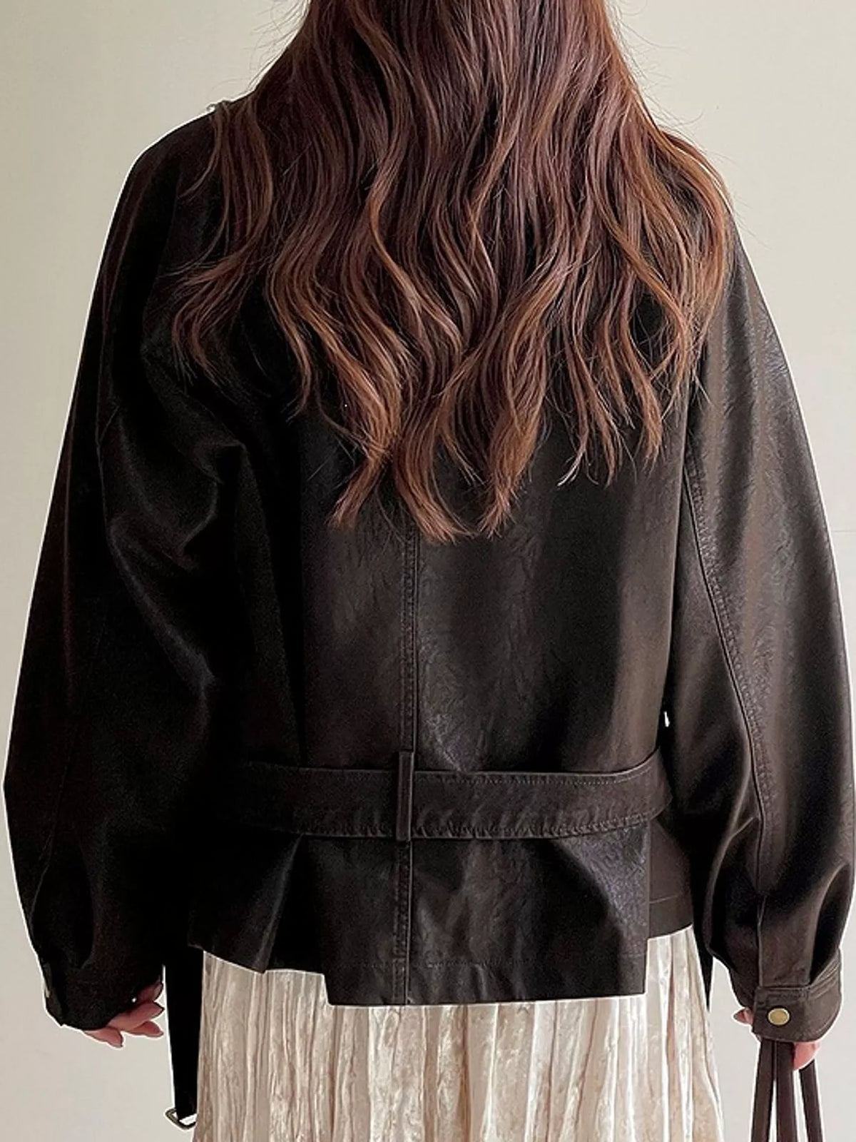 Brown snap down long sleeve jacket, back view