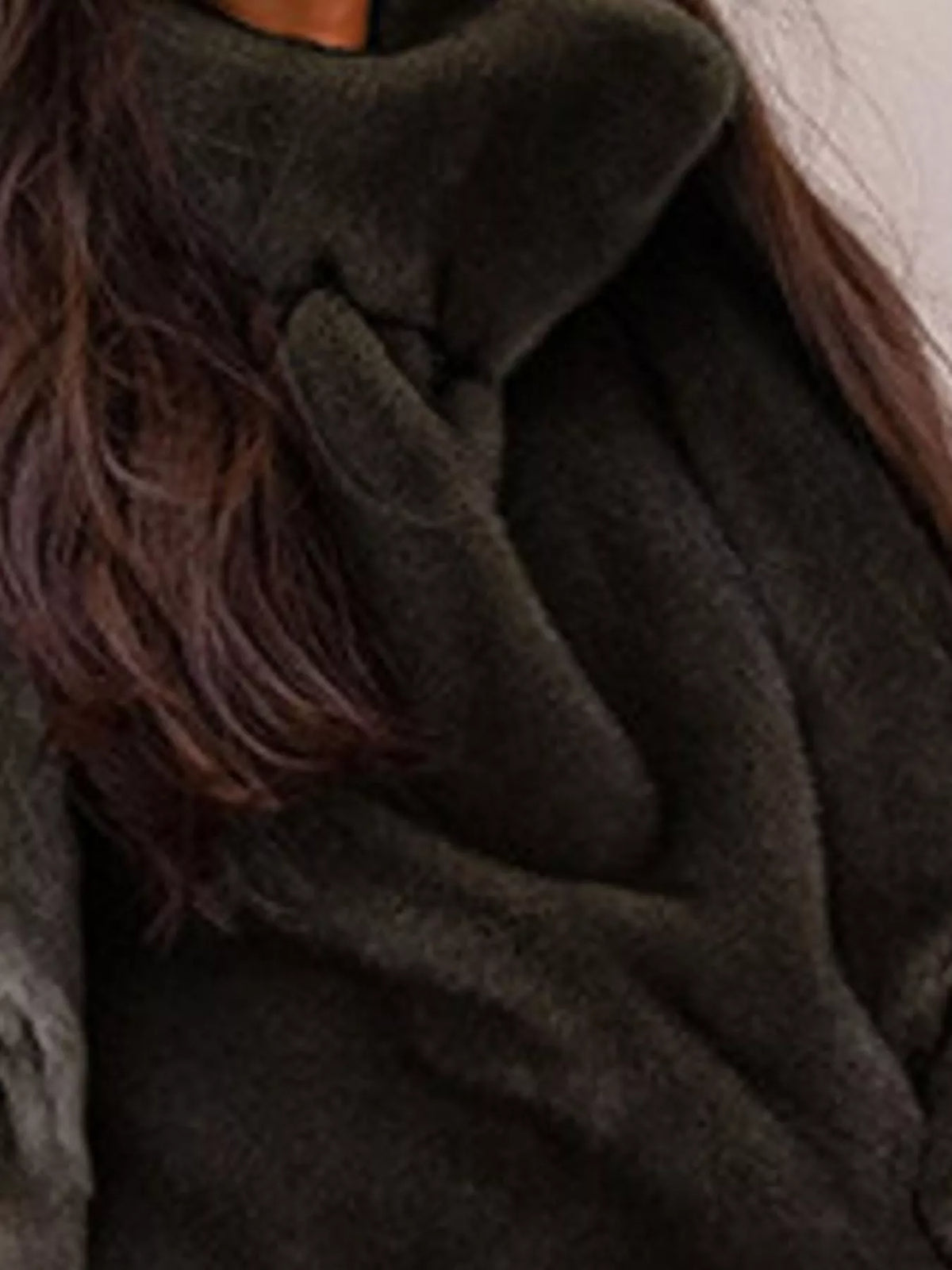 Plush turtleneck vest, brown collar close up