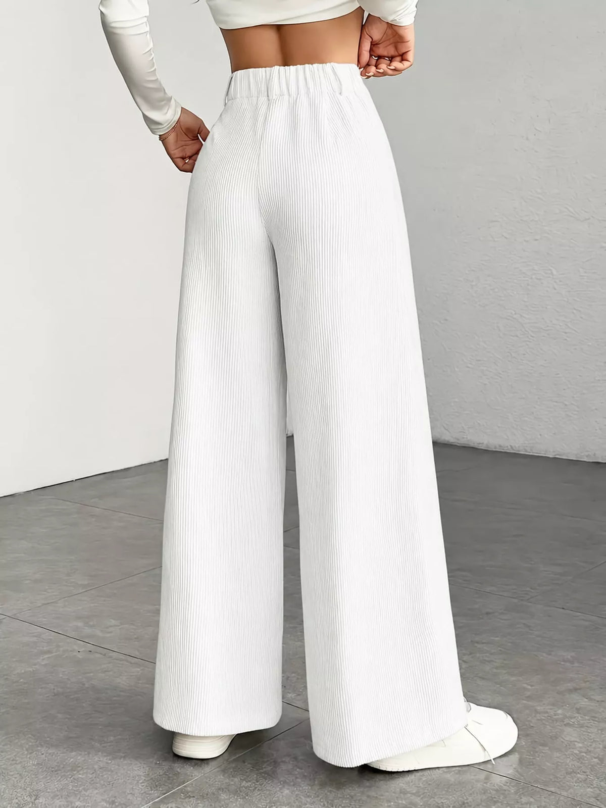 White high-waisted wide-leg pants, back view