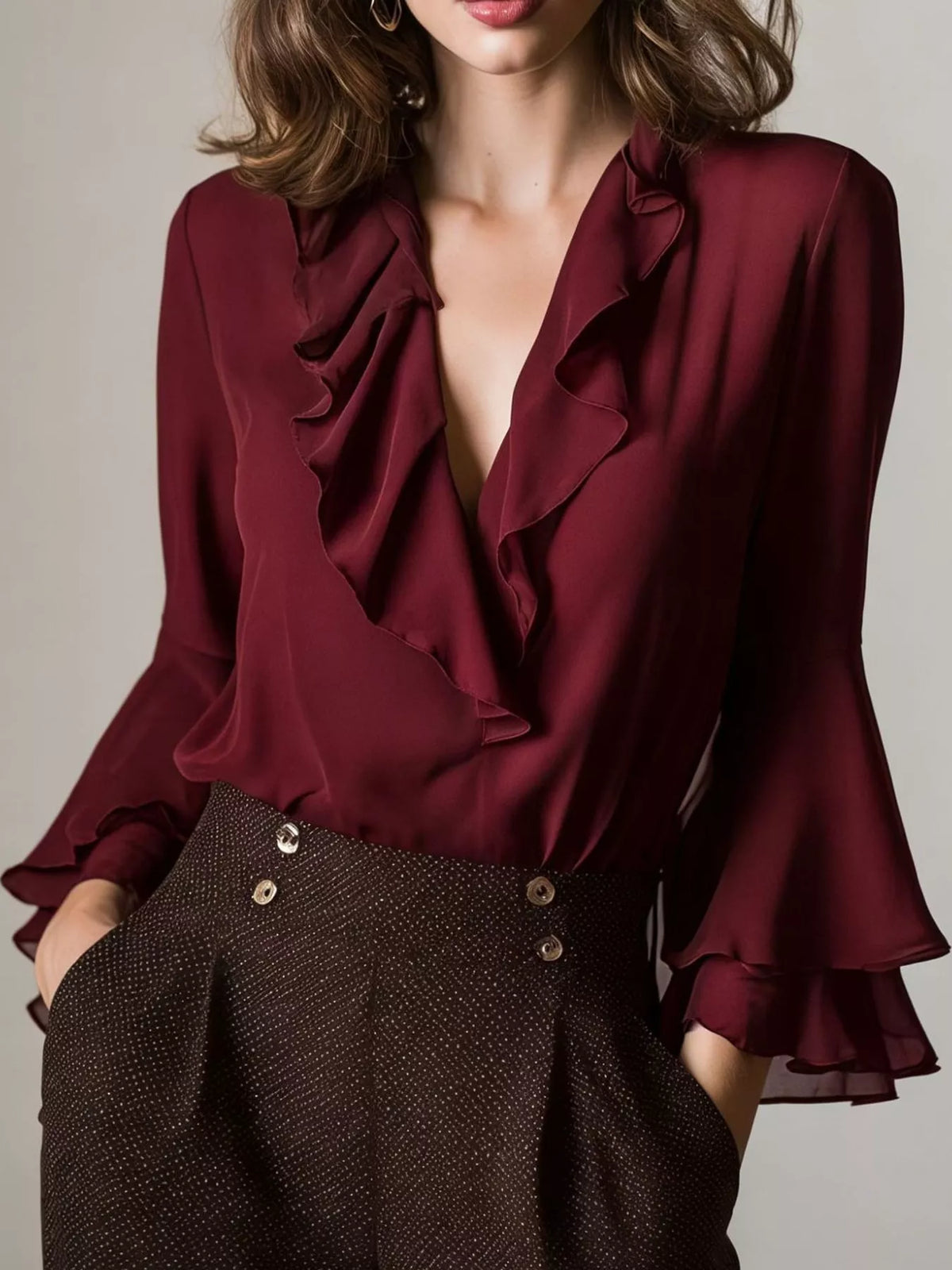 Burgundy ruffle-trim V-neck blouse with tiered bell sleeves