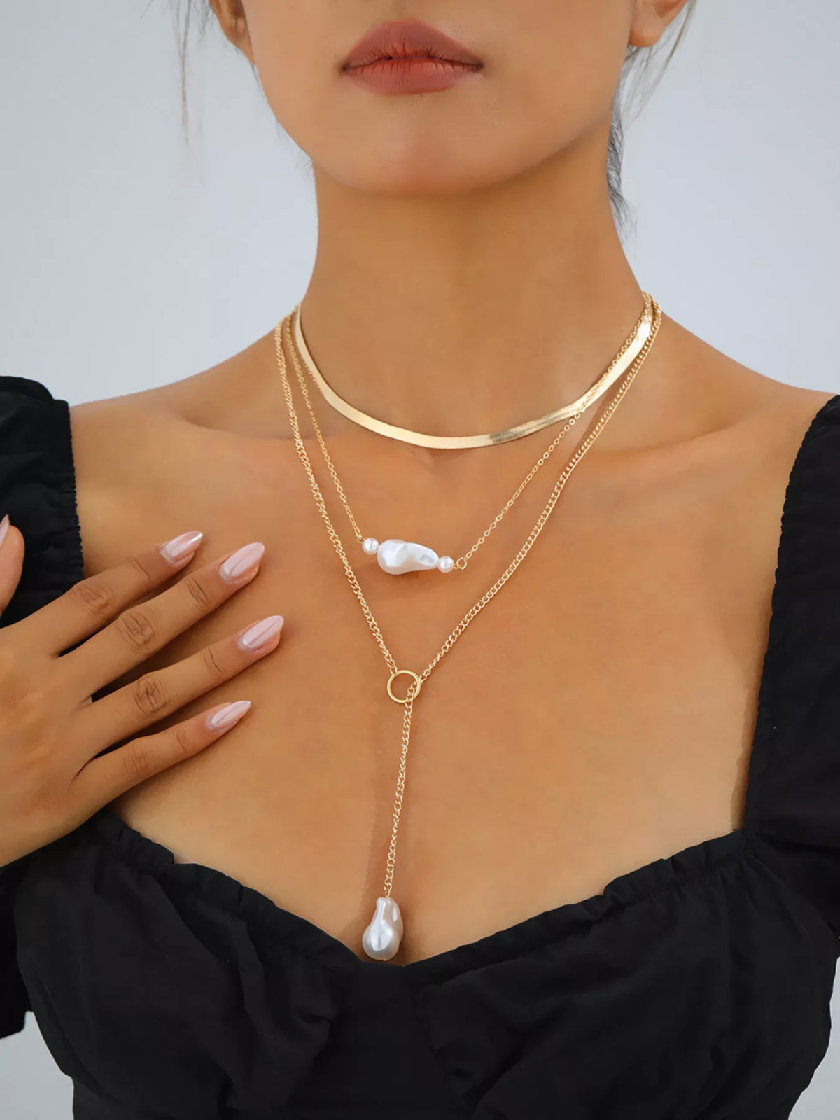 Gold three-layer pearl necklace