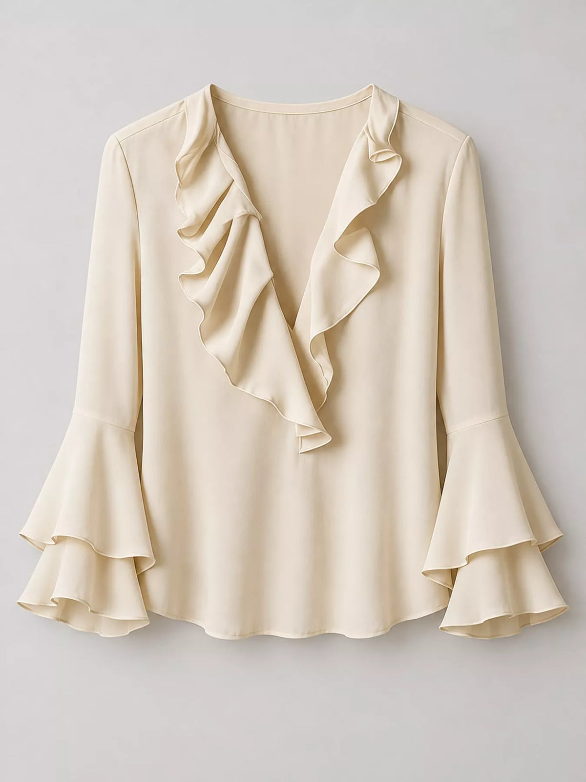 Ivory ruffle-trim V-neck blouse with tiered bell sleeves