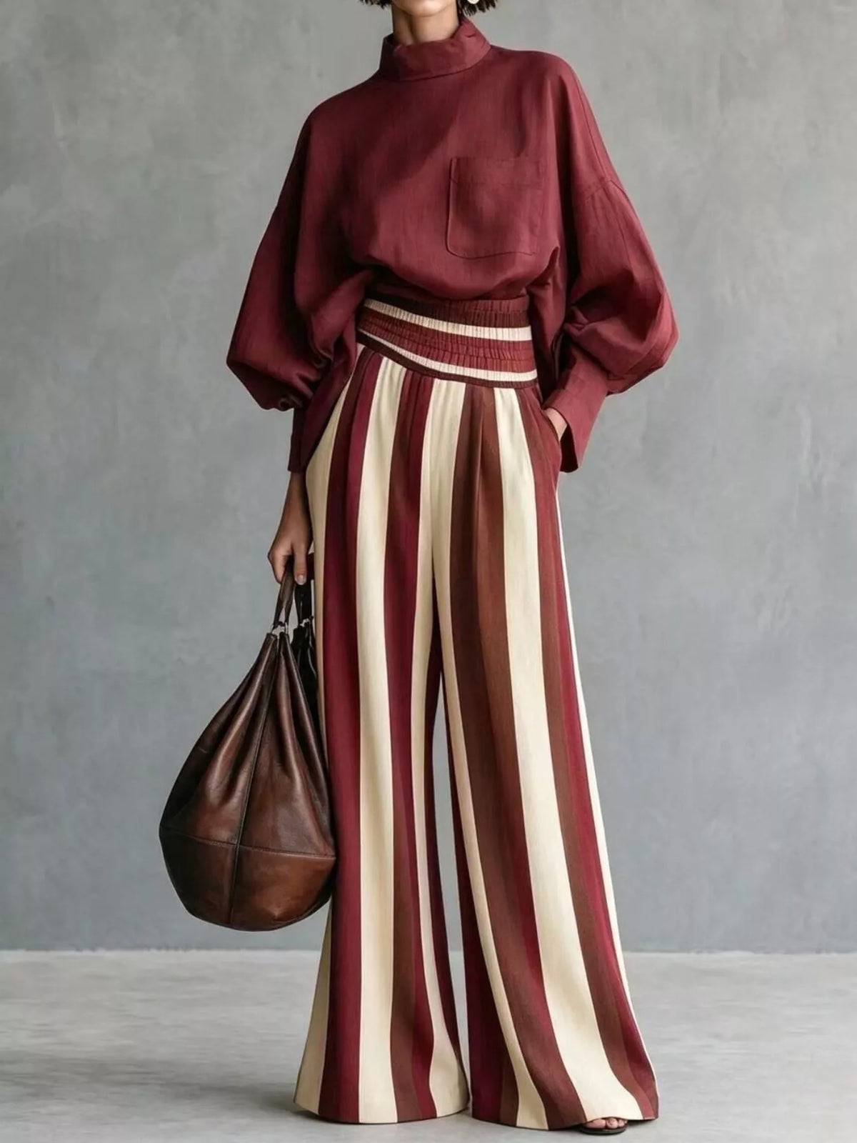 Burgundy mock-neck blouse and striped wide-leg trouser set — front view