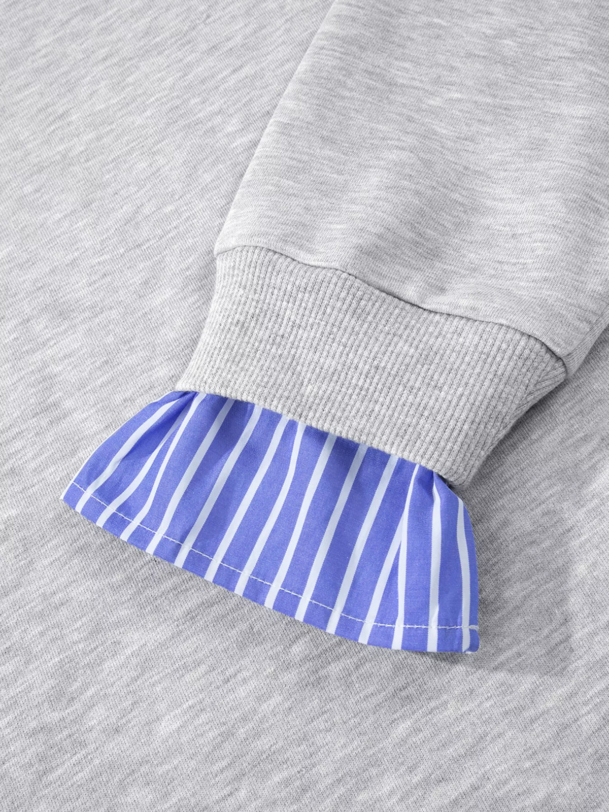 Striped-collar sweatshirt, striped cuff close up