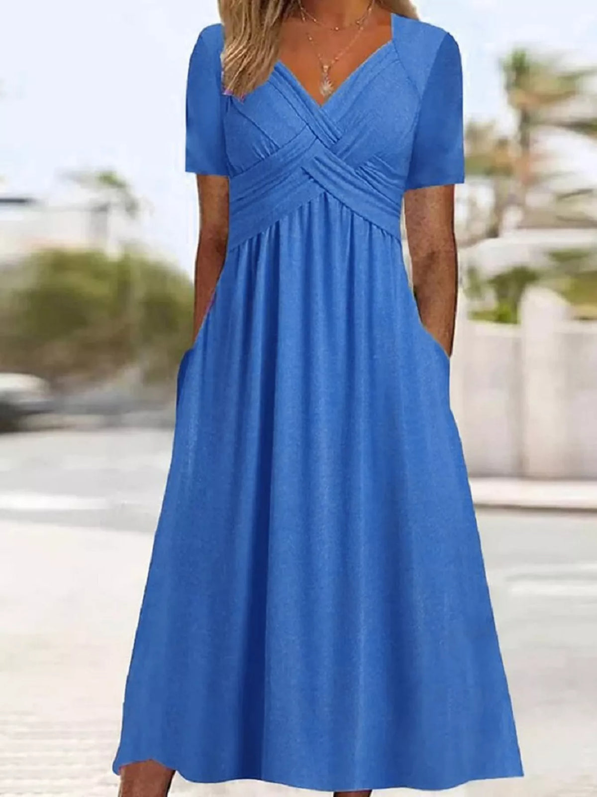 Blue crisscross short sleeve midi dress, front view