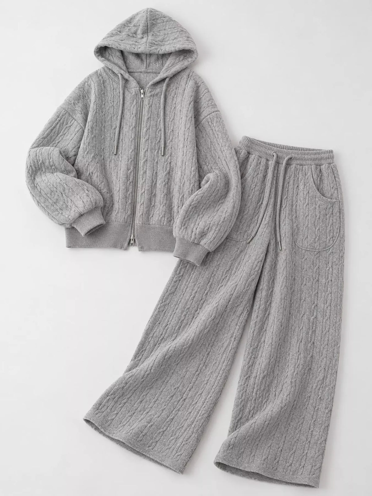Cable-knit cardigan and pants set, light gray flat lay