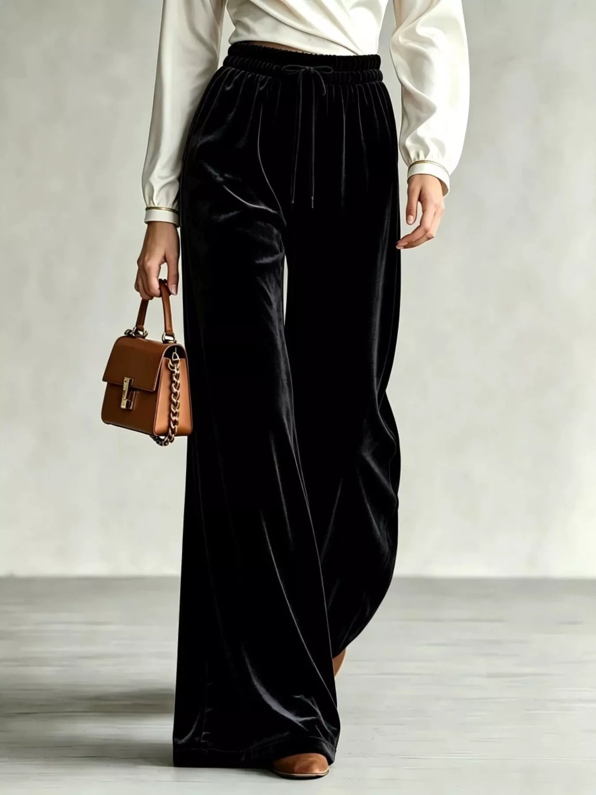 Black wide-leg drawstring velvet pants, front view