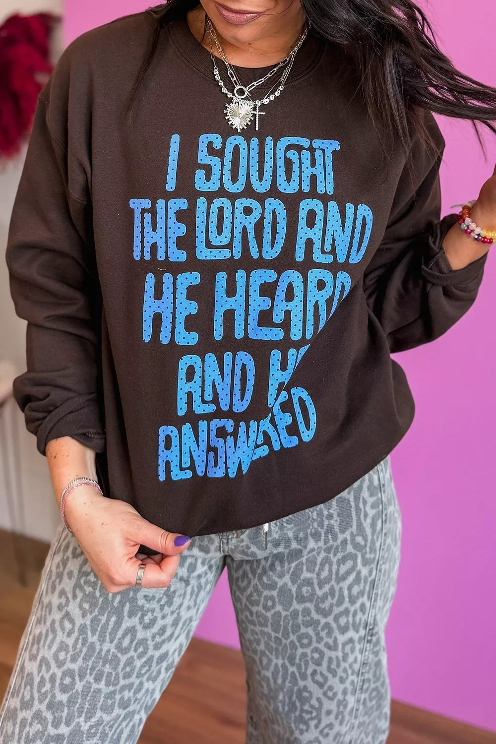 Brown slogan print sweatshirt, front view with blue slogan
