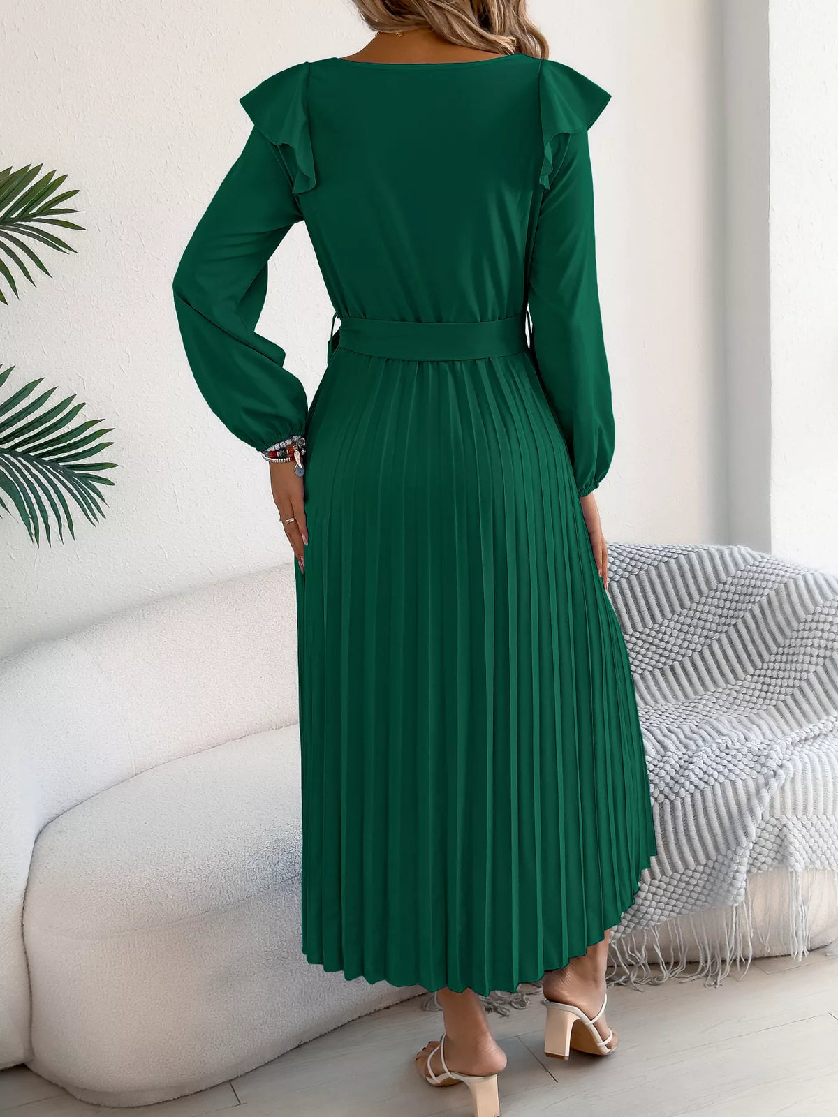 Green ruffled pleated tie-waist midi dress, back view.