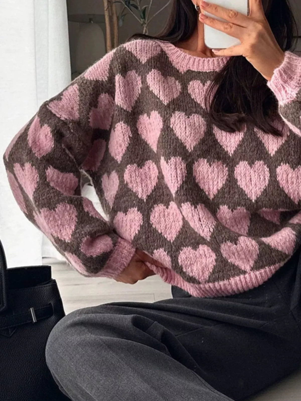 Brown and pink allover heart dropped-shoulder sweater, heart pattern detail.