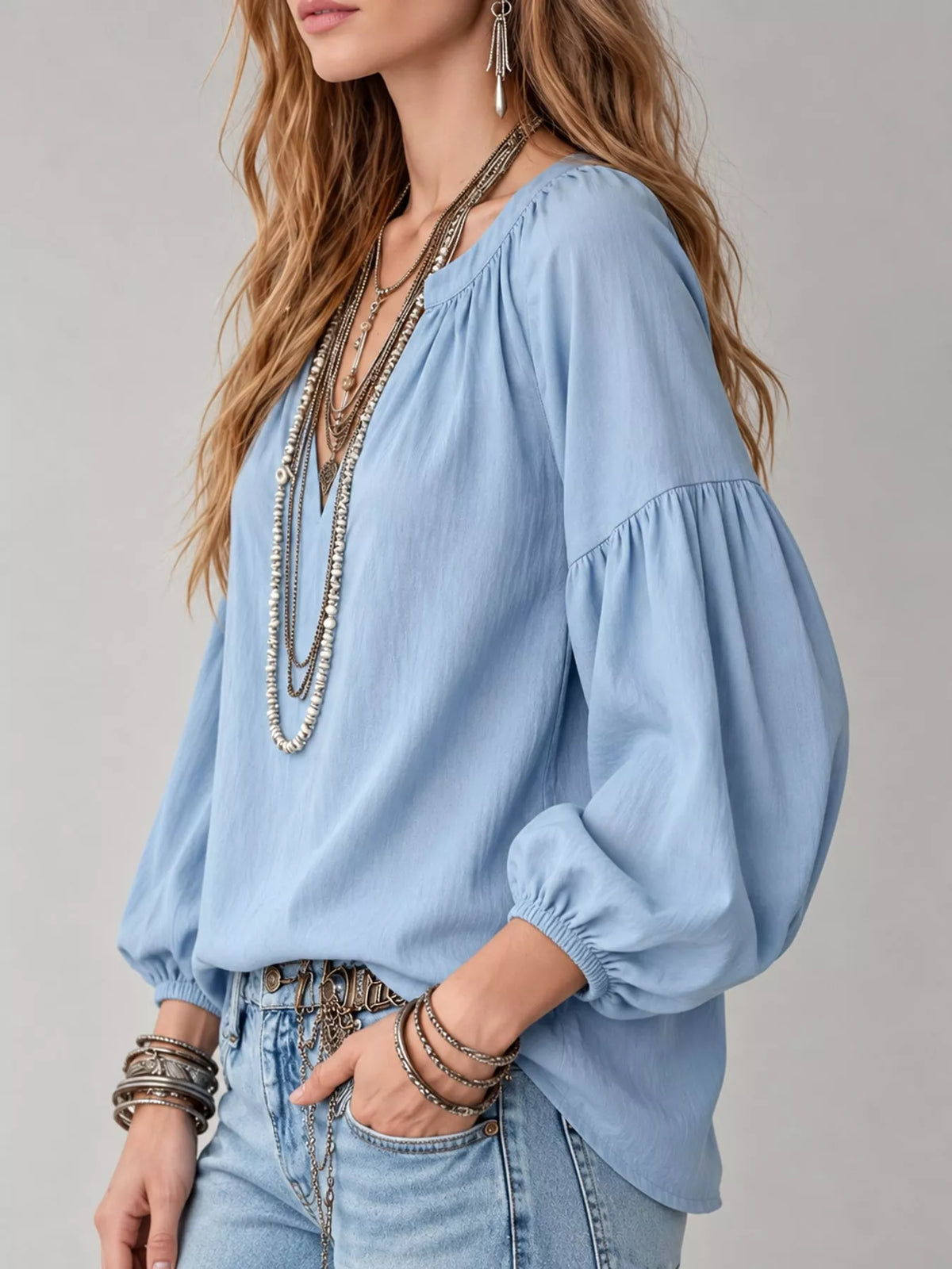 Notched Balloon Sleeve Blouse in light blue, side view