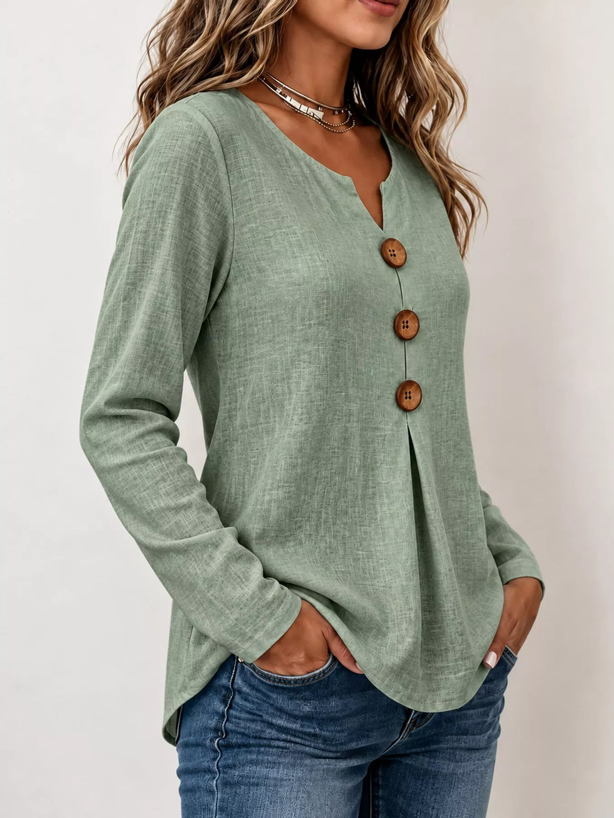 Green long sleeve decorative button blouse