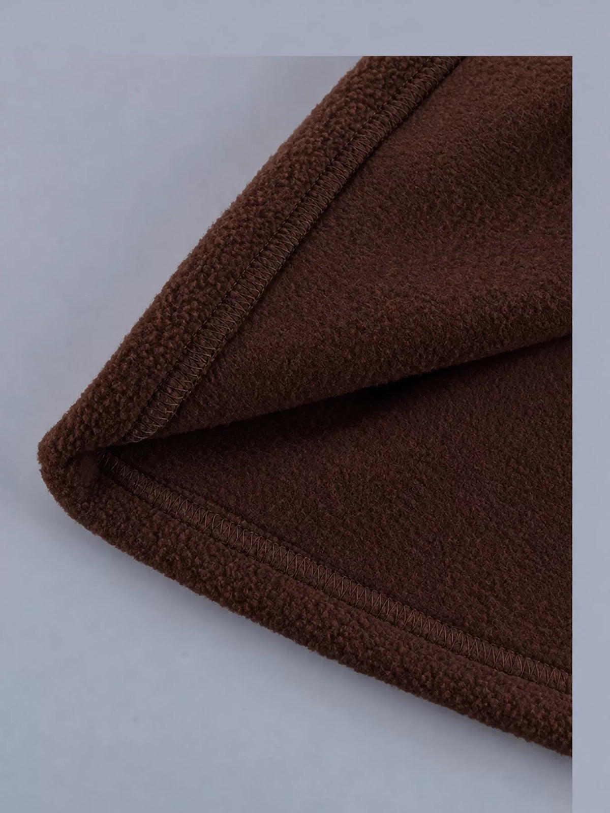 Brown drawstring fleece zip-up jacket, detail view
