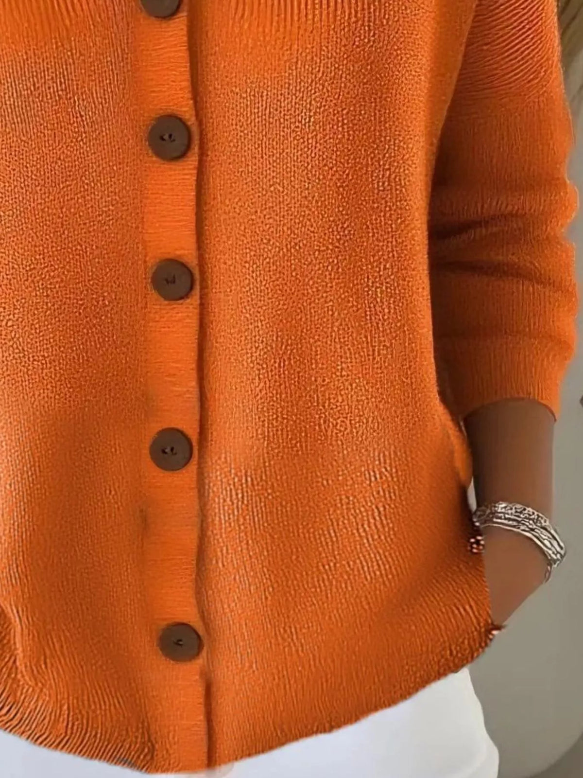 Women's V-Neck Button-Down Knit Cardigan in orange — button detail view
