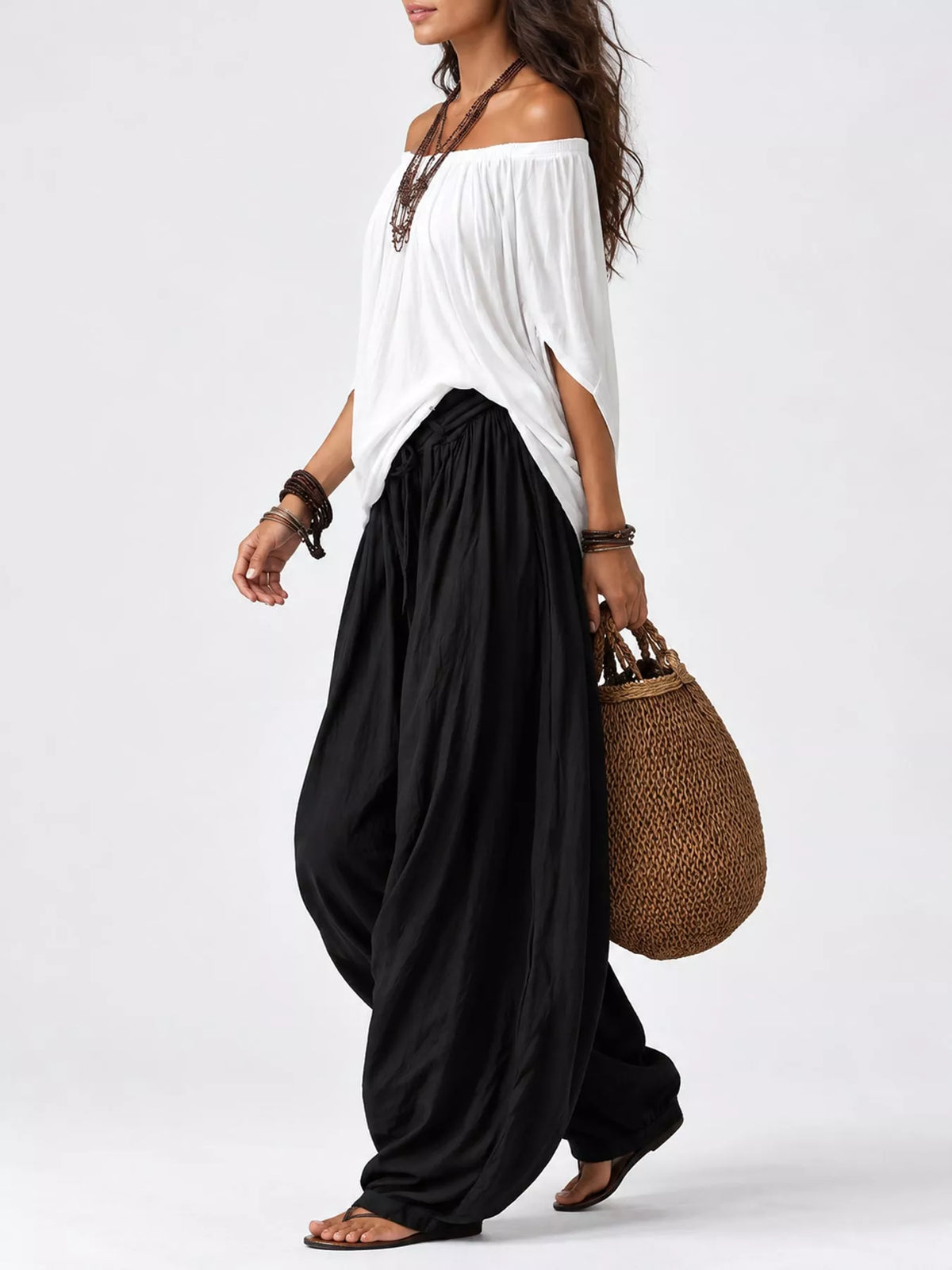 White top and black pants off-shoulder top and wide-leg harem pants set — side view
