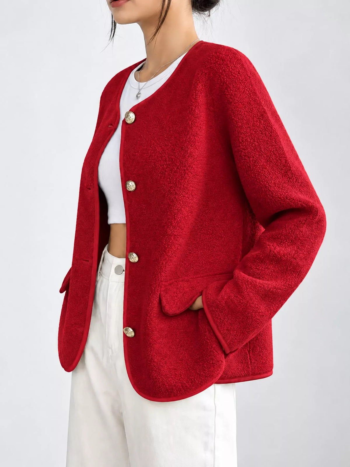 Red textured button-front jacket — side view