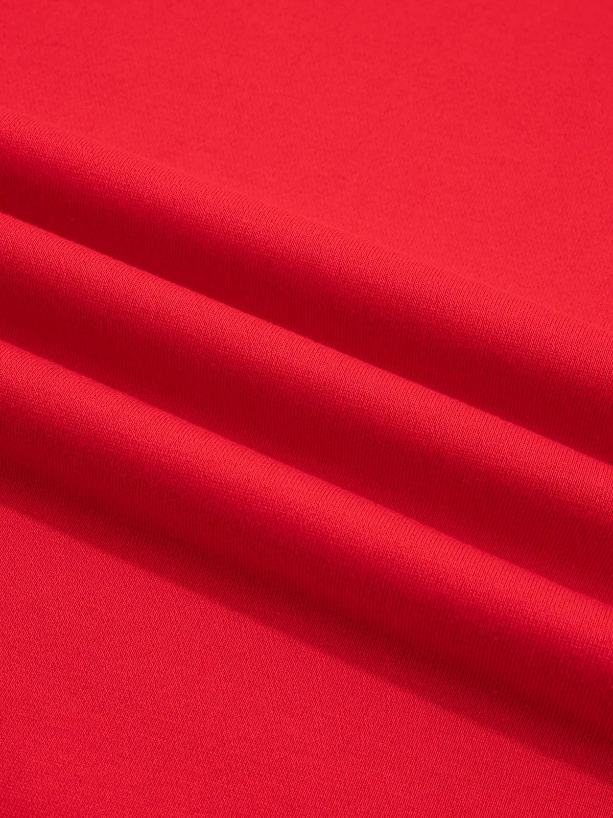 Red sweatshirt with contrast striped ribbed trim, fabric detail