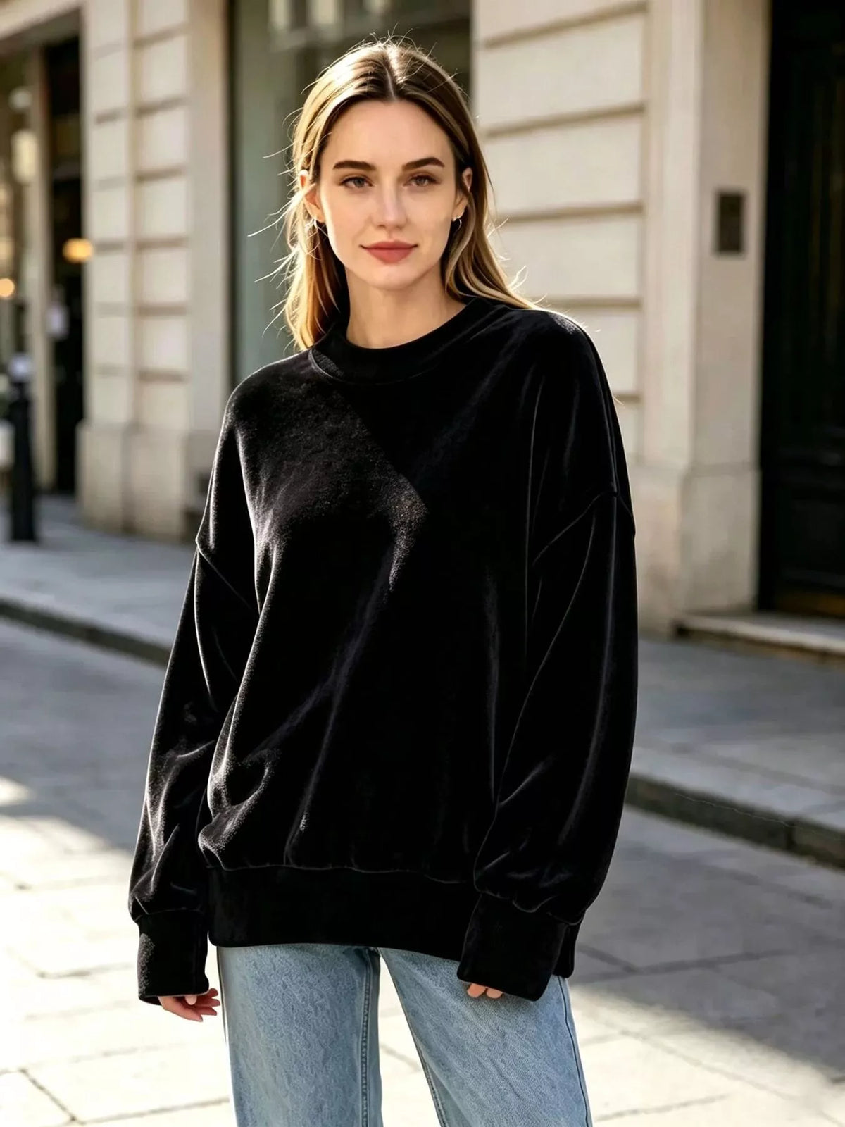 Women's Velvet Crew Neck Dropped Shoulder Sweatshirt in black — front view