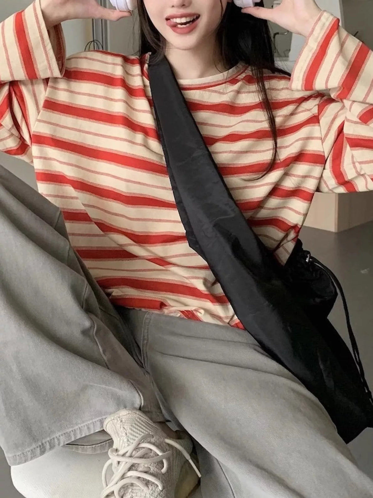 Red and cream striped oversized T-shirt, sleeve view